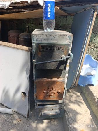 Печь для отопления,под уголь
