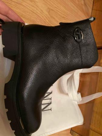 Продам зимние ботинки