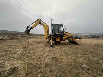 Услуги экскаватора-погрузчика 3в1 глубина копания 5 метров катерпиллер