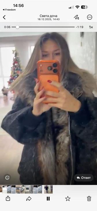 Продам пуховик с мехом