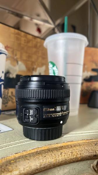Линза для камер Nikon