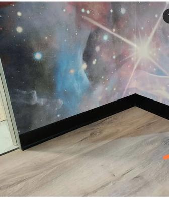 Укладка ламината, установка плинтуса