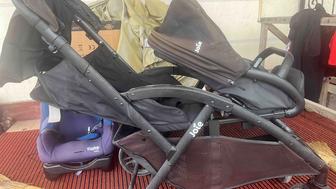 Коляска для погодок