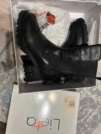 Продам зимние сапоги