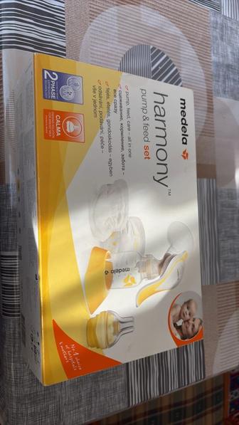 Молокоотсос medela