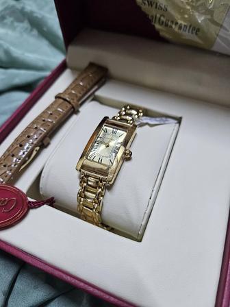 Продам новые золотые часы