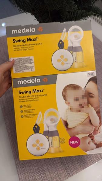 Молокоотсос электрический Medela