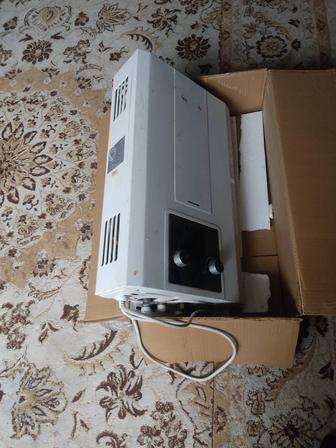 Продам газовый проточный водонагреватель