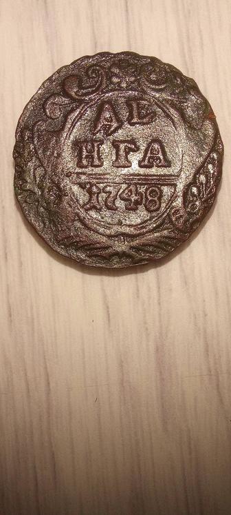Монета