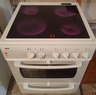 Электроплита , поверхность керамика, плита , духовка 2 противнья, решетка.