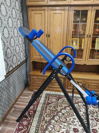 Тренажерный стол для разтяжки позвоночника