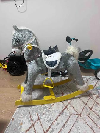 Конь качалка