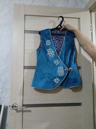 Продам Национальный новый камзол двусторонний размер от 42до 48худенким.