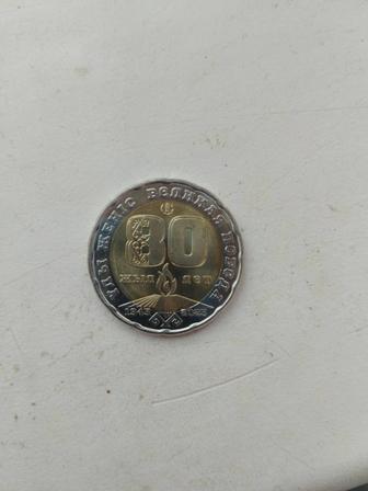 Продам монета 200 тг