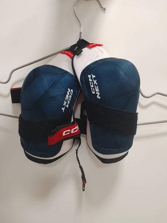 Налокотники CCM NEXT YTH белый, синий L Детские