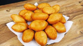 Жареные пирожки, сосиски в тесте