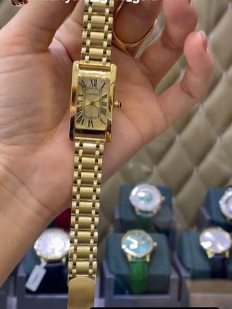 Продам золотые часы новые