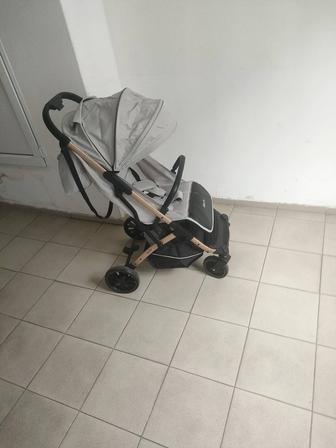 Продам прогулочная коляска легкая новая