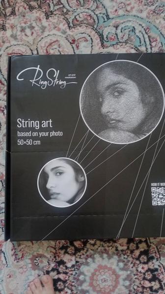 Картина из нитей.