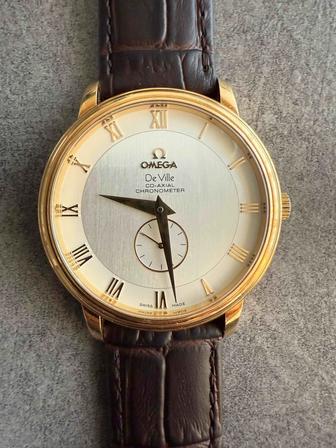 Omega De Ville золотые часы