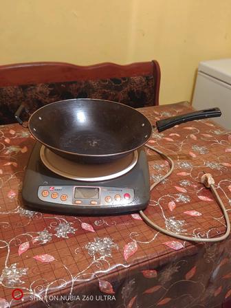 Продам индукционную плиту со сковородой вок