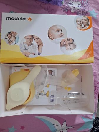 Молокоотсос