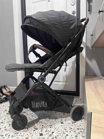 Продам прогулочную коляску Nuovita
