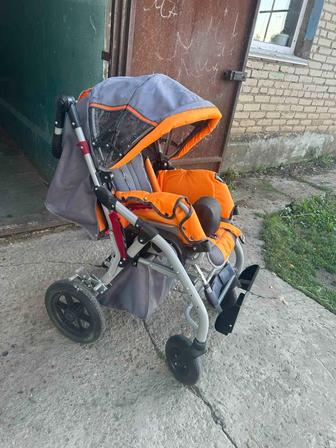 Продам детскую инвалидную коляску