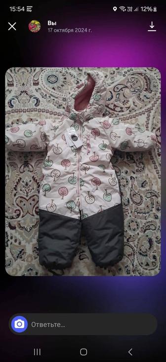 Продам новый зимний комбинезон, размер 92