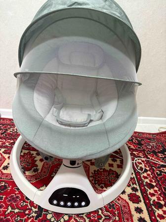 Продам детский музыкальный шизлонг