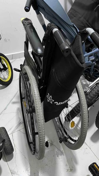 Инвалидная коляска