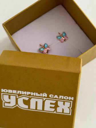 Продам золотые серьги