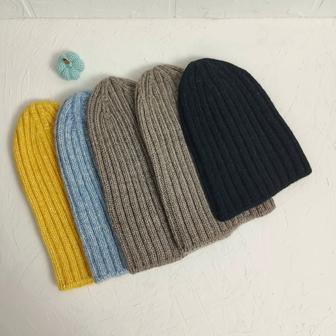 Шапки ручной работы из пряжи от итальянских производителей.