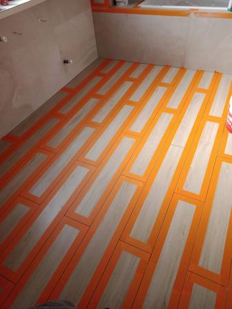 Услуги кафельщика укладка ламинат
