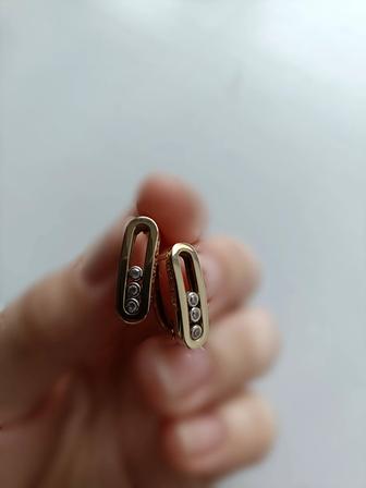 Продам золотые серьги