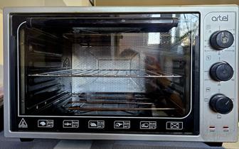 Продаю электрическую духовку Artel в отличном состоянии