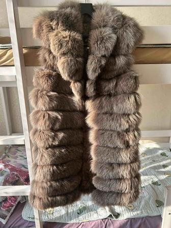 Продам меховую жилетку