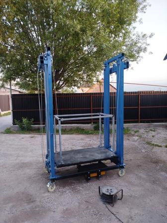 Строительный леса с электрическим подъемом