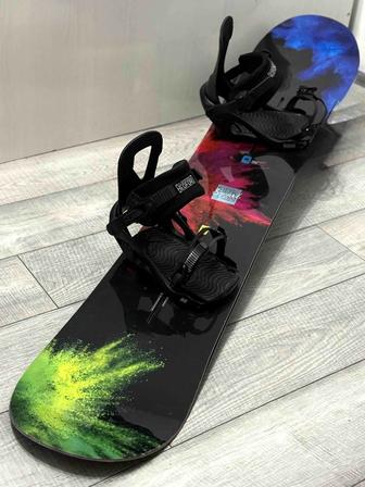 Продам новый сноуборд с креплениями