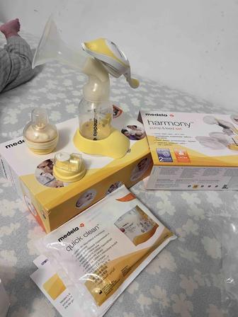 продам молокоотсос medela harmony