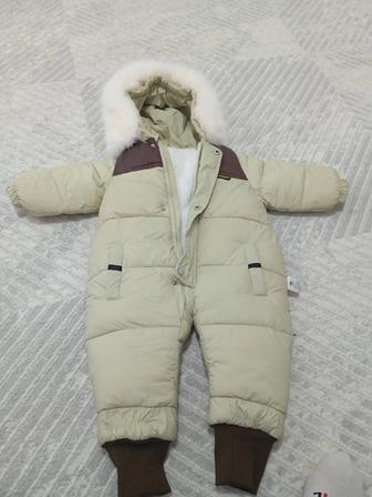 Продам детский зимний комбинезон. Как новая. Мало одевали