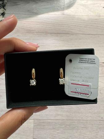 Продам золотые серьги