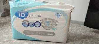 Продам ходунки и подгузники