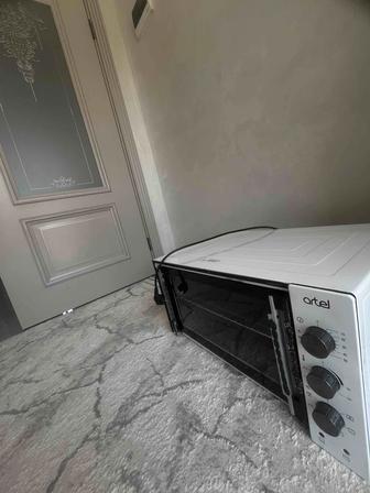 Продам электрическую печь Artel