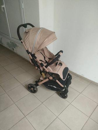 Продам прогулочная коляска легкая новая