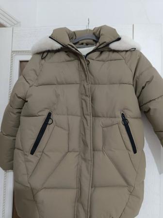 Продам пуховик на девочку 5-6лет новый