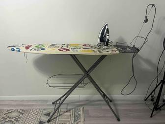 Гладильная доска и утюг