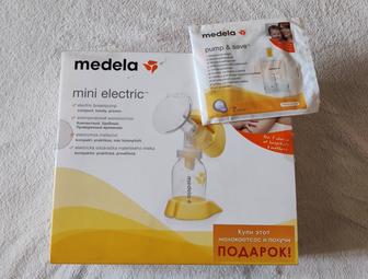 Молокоотсос Medela mini electric