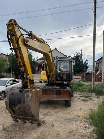 Услуги колесного экскаватора
