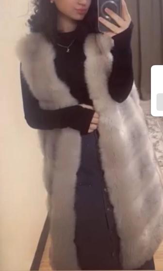 Меховая жилетка женская